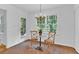 Cozy breakfast nook with charming table set and backyard views at 1590 Sunnybrook Farm Rd, Atlanta, GA 30350