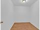 Small closet with wood-look floors at 1590 Sunnybrook Farm Rd, Atlanta, GA 30350