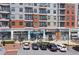 Street view of mixed-use building with storefronts and apartments featuring private balconies at 1590 Sunnybrook Farm Rd, Atlanta, GA 30350