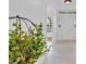 Bright foyer with leafy plant decor and view into the light-filled home at 1590 Sunnybrook Farm Rd, Atlanta, GA 30350