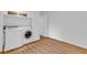 Functional laundry area with modern washer and dryer units, plus ample storage at 1590 Sunnybrook Farm Rd, Atlanta, GA 30350