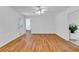 Bright living room showcases hardwood flooring, crown molding, and ample natural light, creating a welcoming atmosphere at 1590 Sunnybrook Farm Rd, Atlanta, GA 30350