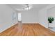 Spacious living room with gleaming hardwood floors, fresh paint, and modern trim at 1590 Sunnybrook Farm Rd, Atlanta, GA 30350