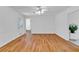 Bright living room features beautiful wood floors and ample natural light at 1590 Sunnybrook Farm Rd, Atlanta, GA 30350