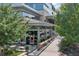 Outdoor seating is available at this restaurant with a landscaped walkway and modern architecture at 1590 Sunnybrook Farm Rd, Atlanta, GA 30350