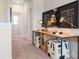 Hallway features a work area with matching ottomans and modern decor at 3268 Shirecrest Ln, Dacula, GA 30019