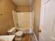 Standard bathroom featuring a combination tub and shower unit at 535 Village Cir, Stockbridge, GA 30281