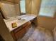 Bathroom featuring vanity and view of shower and toilet at 535 Village Cir, Stockbridge, GA 30281