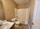 Standard bathroom featuring a combination tub and shower unit at 535 Village Cir, Stockbridge, GA 30281