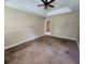 Spacious bedroom featuring a ceiling fan and a neutral color scheme at 535 Village Cir, Stockbridge, GA 30281