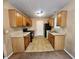 Galley-style kitchen with updated appliances, ample counter space, and plenty of cabinet storage at 535 Village Cir, Stockbridge, GA 30281