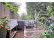 Inviting back deck with comfortable seating, lush greenery, and peaceful ambiance at 770 Barnett Street Ne, Atlanta, GA 30306