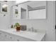 Bright bathroom features double sinks, quartz countertops and modern fixtures at 770 Barnett Street Ne, Atlanta, GA 30306