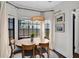 Bright breakfast nook features a bay window and modern lighting at 770 Barnett Street Ne, Atlanta, GA 30306