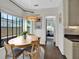 Cozy dining area with natural light, modern lighting and convenient kitchen access at 770 Barnett Street Ne, Atlanta, GA 30306