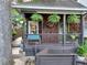 Charming front porch with hanging ferns and bench seating creates a welcoming entrance at 770 Barnett Street Ne, Atlanta, GA 30306