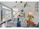 Inviting living room with large windows, wood floors, and comfortable seating arrangement at 770 Barnett Street Ne, Atlanta, GA 30306