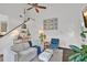 Bright living room features high ceilings, a ceiling fan, and ample natural light at 770 Barnett Street Ne, Atlanta, GA 30306