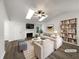 Bright living room with vaulted ceilings, fireplace, and stylish furnishings at 7972 Woodlake Dr, Riverdale, GA 30274