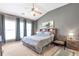 Bright bedroom with large windows, modern decor, and vaulted ceilings at 918 Harvest Brook Dr, Lawrenceville, GA 30043