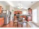 Bright kitchen with stainless steel appliances, wood cabinets, and access to the backyard at 918 Harvest Brook Dr, Lawrenceville, GA 30043
