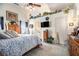 Inviting bedroom featuring vaulted ceilings, natural light, and warm, neutral tones and decor at 1875 Conners Ct, Lawrenceville, GA 30044