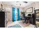 Bedroom with a ceiling fan, a large window, and a desk with a computer on it at 1875 Conners Ct, Lawrenceville, GA 30044