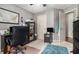 Spacious bedroom featuring a work station and view of two doors leading to other rooms at 1875 Conners Ct, Lawrenceville, GA 30044