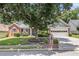 Charming one story home with a two car garage, brick mailbox and mature trees at 1875 Conners Ct, Lawrenceville, GA 30044