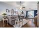 Comfortable living room with hardwood floors, gray walls, fireplace, and ample seating at 1875 Conners Ct, Lawrenceville, GA 30044