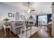 Bright and inviting living room featuring hardwood floors, a cozy fireplace, and elegant decor for comfortable living at 1875 Conners Ct, Lawrenceville, GA 30044