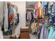 Spacious walk-in closet offering ample storage with built-in shelving and organization features at 1875 Conners Ct, Lawrenceville, GA 30044