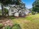 Large backyard with a deck, shed, and plenty of space for outdoor activities at 5021 Rodrick Trce, Marietta, GA 30066