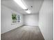 Finished basement with new carpet and ample natural light, ideal for Gathering activities at 5021 Rodrick Trce, Marietta, GA 30066
