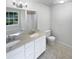 Bathroom featuring a double sink vanity, neutral tile floor and combination tub and shower at 5021 Rodrick Trce, Marietta, GA 30066