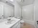 Well-maintained bathroom featuring a shower-tub combo and large mirror at 5021 Rodrick Trce, Marietta, GA 30066