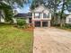 Charming two-story home with a two-car garage and a well-manicured front yard at 5021 Rodrick Trce, Marietta, GA 30066