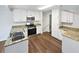 Well-lit kitchen featuring granite countertops, stainless steel appliances, and ample cabinet space at 5021 Rodrick Trce, Marietta, GA 30066