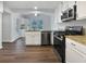Modern kitchen with granite countertops and stainless steel appliances at 5021 Rodrick Trce, Marietta, GA 30066