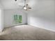 Large primary bedroom with a vaulted ceiling and a generous sized window at 5021 Rodrick Trce, Marietta, GA 30066