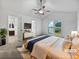 Spacious main bedroom offering a ceiling fan, ensuite bath, and walk-in closet at 5021 Rodrick Trce, Marietta, GA 30066