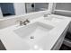 Bright bathroom with white quartz countertop, modern faucet, and double vanity at 766 Brian Ln, Forest Park, GA 30297