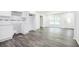 Open-concept kitchen area with ample natural light, new cabinets, and stylish backsplash ready for appliances at 766 Brian Ln, Forest Park, GA 30297