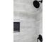 Shower features gray marble tiles, modern rainfall showerhead, and built-in shower niche at 766 Brian Ln, Forest Park, GA 30297