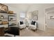 A bright sitting area features accent seating and art at 113 Maplewood Ln, Conyers, GA 30094