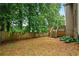 A backyard with a privacy fence and deck at 507 Mirramont Pl, Woodstock, GA 30189