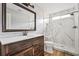 Modern bathroom featuring a walk-in shower, and granite vanity at 507 Mirramont Pl, Woodstock, GA 30189