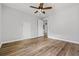 Bedroom featuring a ceiling fan and wood-look flooring at 507 Mirramont Pl, Woodstock, GA 30189
