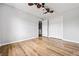 Bedroom featuring vinyl floors, ceiling fan, and a closet for ample storage at 507 Mirramont Pl, Woodstock, GA 30189
