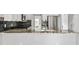 Modern kitchen featuring granite countertops, stainless steel appliances, and a stylish backsplash at 507 Mirramont Pl, Woodstock, GA 30189